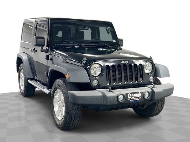 2015 Jeep Wrangler Sport in Black — front three-quarter view