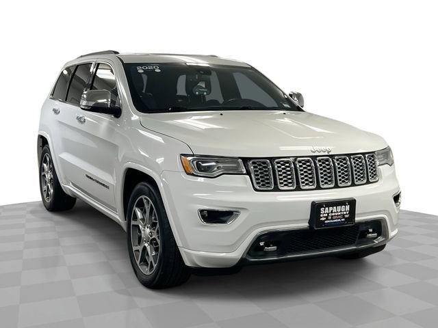 2020 Jeep Grand Cherokee Overland 4X4 in White — front three-quarter view