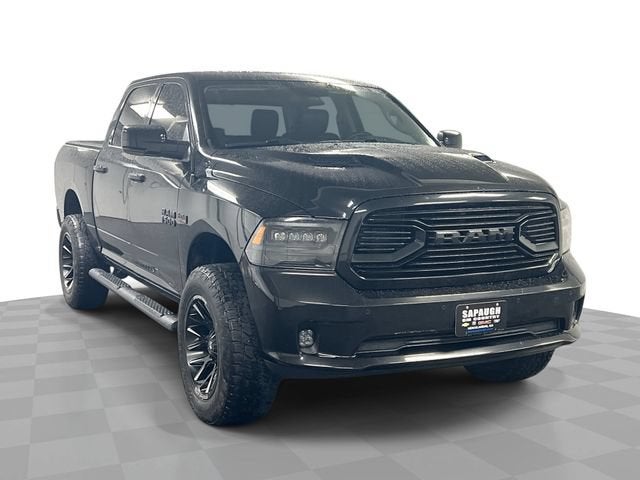 2018 RAM 1500 Sport in Black — front three-quarter view