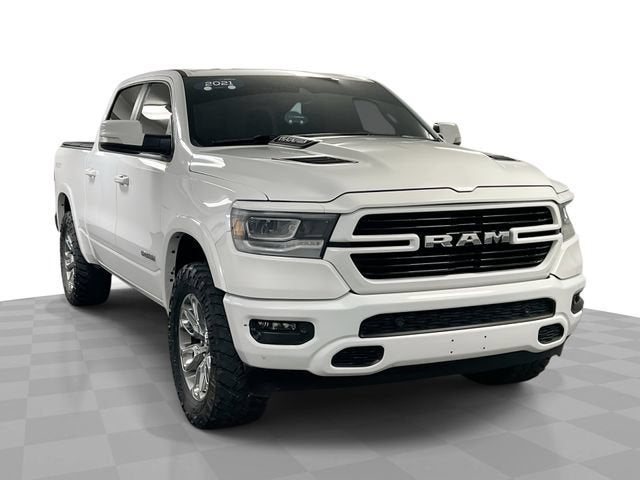 2021 RAM 1500 Laramie in White — front three-quarter view