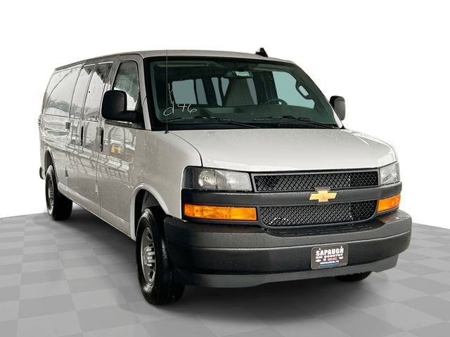 2026 Chevrolet Express Passenger LS in Summit White — front three-quarter view