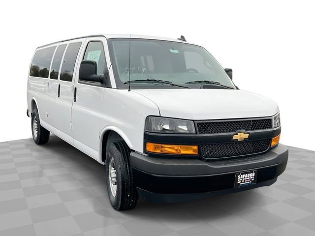 2026 Chevrolet Express Passenger LS in Summit White — front three-quarter view