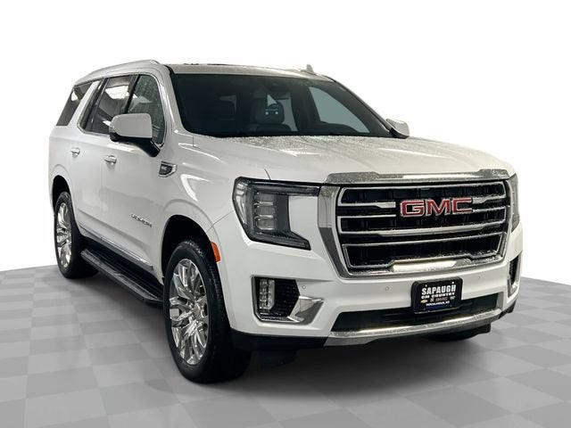 2024 GMC Yukon SLT in Summit White — front three-quarter view