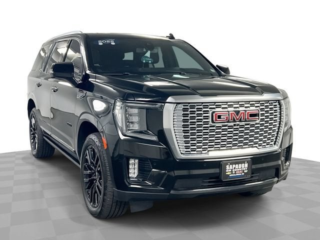 2022 GMC Yukon Denali in Onyx Black — front three-quarter view