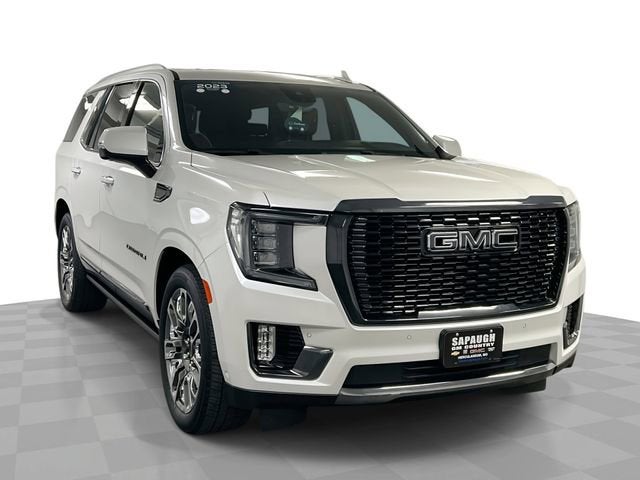 2023 GMC Yukon Denali Ultimate in White Frost Tricoat — front three-quarter view