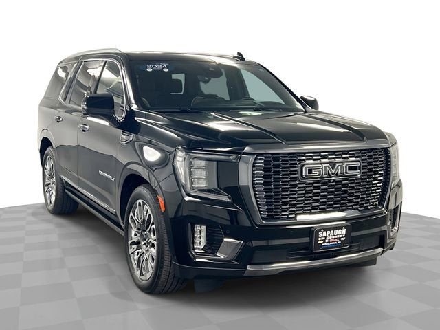 2024 GMC Yukon Denali Ultimate in Onyx Black — front three-quarter view