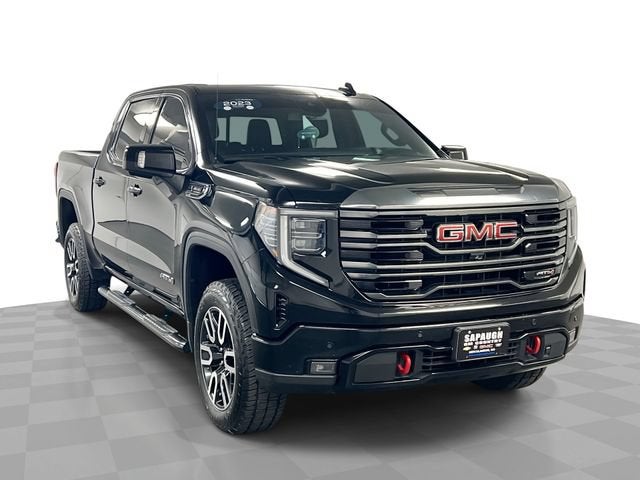 2023 GMC Sierra 1500 AT4 in Onyx Black — front three-quarter view