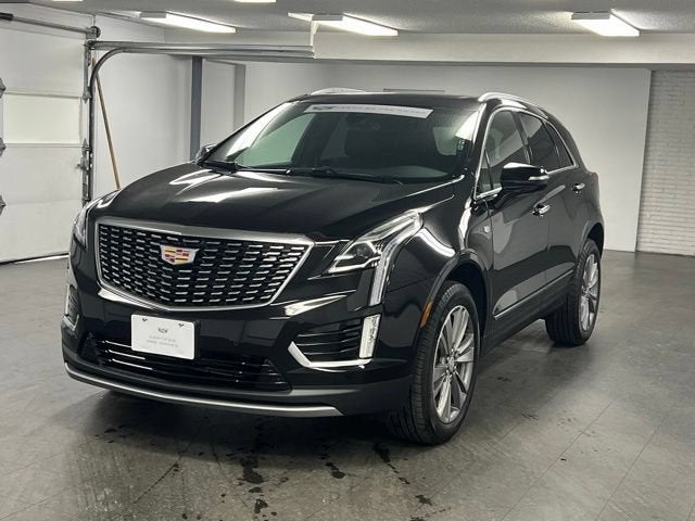 2025 Cadillac XT5 Premium Luxury in Stellar Black Metallic — front three-quarter view