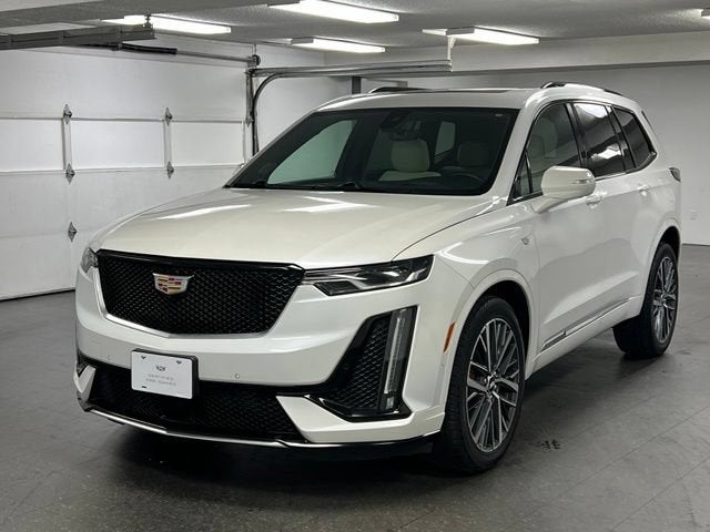 2025 Cadillac XT6 Sport in Crystal White Tricoat — front three-quarter view