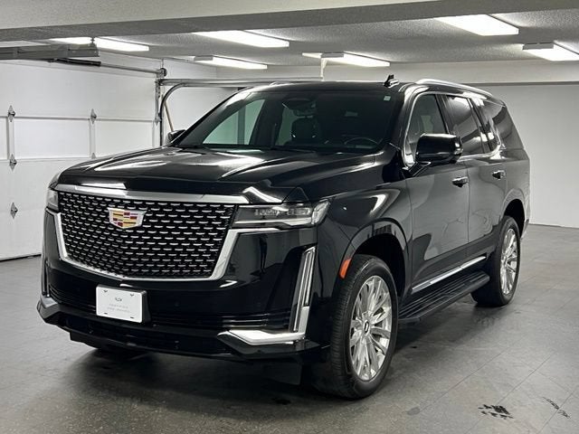 2024 Cadillac Escalade Premium Luxury in Black Raven — front three-quarter view