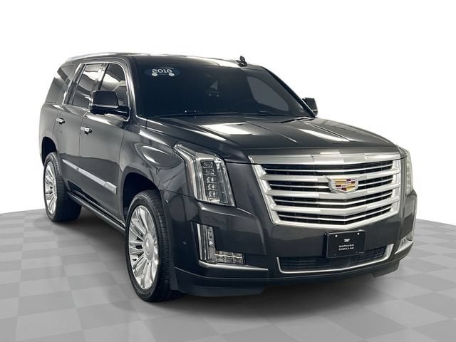 2018 Cadillac Escalade Platinum in Dark Granite Metallic — front three-quarter view
