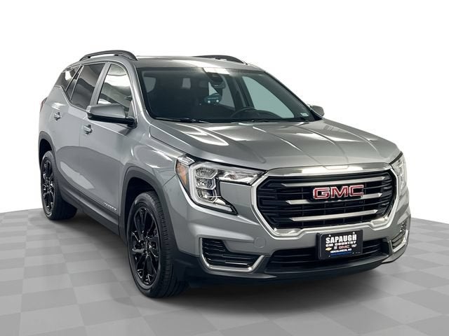 2024 GMC Terrain SLE in Sterling Metallic — front three-quarter view