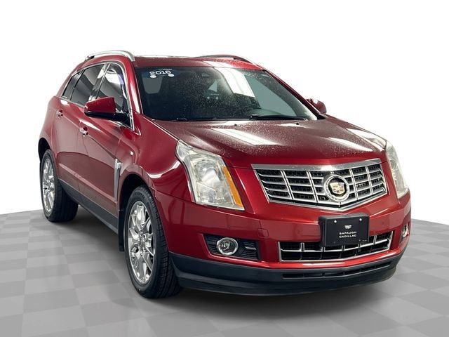 2016 Cadillac SRX Premium Collection in Crystal Red Tintcoat — front three-quarter view