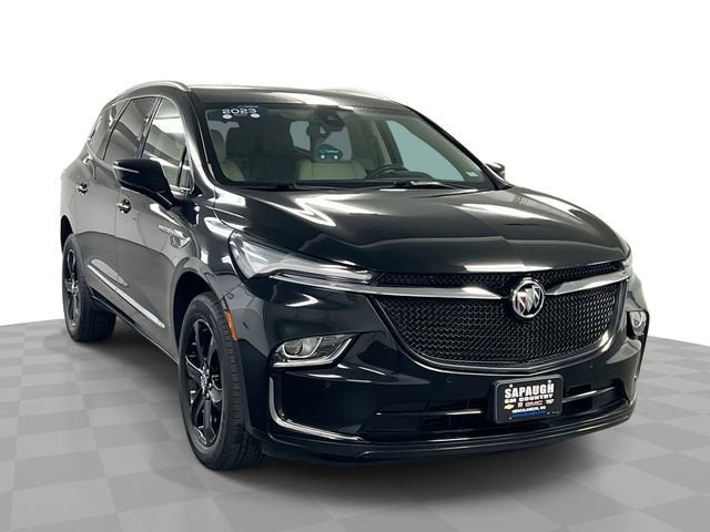2023 Buick Enclave Essence in Ebony Twilight Metallic — front three-quarter view