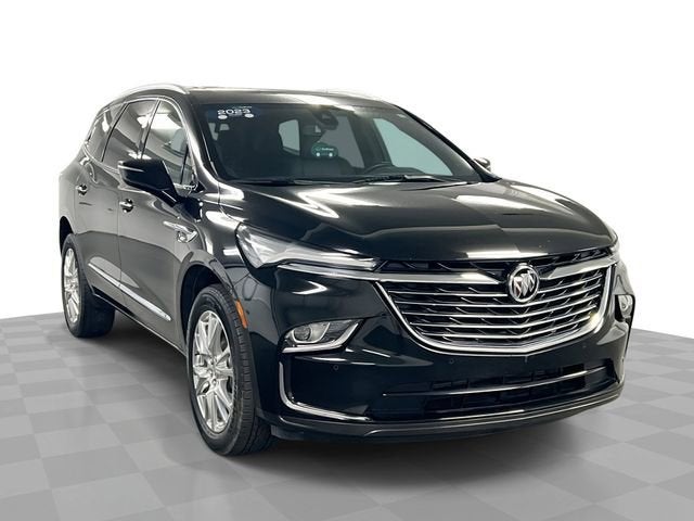 2023 Buick Enclave Essence in Ebony Twilight Metallic — front three-quarter view